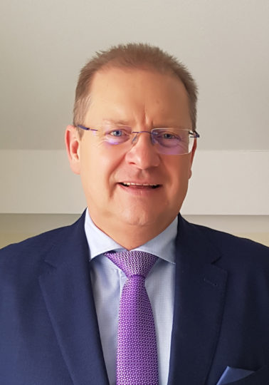 Dr. Henning Freund